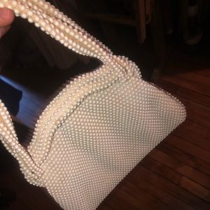 trendy little vintage cream pearl purse.